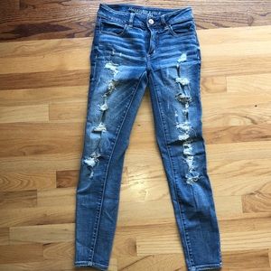 American Eagle distressed medium wash denim jeans